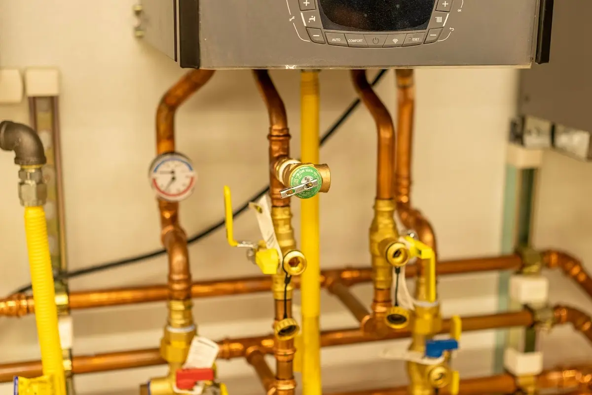 Licensed technician providing Water Heater Installation for a homeowner in Brighton